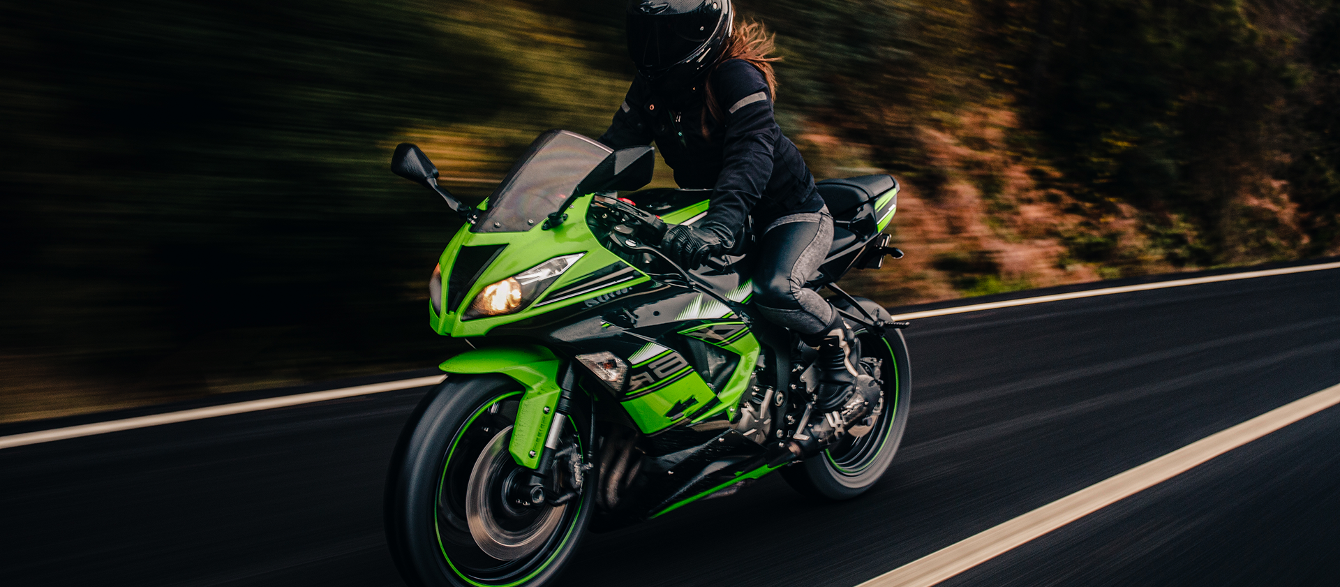 Banner Kawasaki - driving-green-motorcycle-road 2